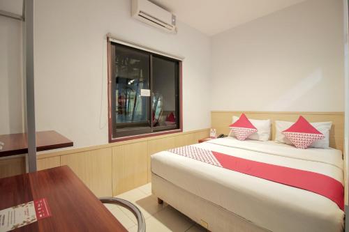 Imagen de la habitación del Hotel Collection O 295 Grha Ciumbuleuit Guest House. Foto 20