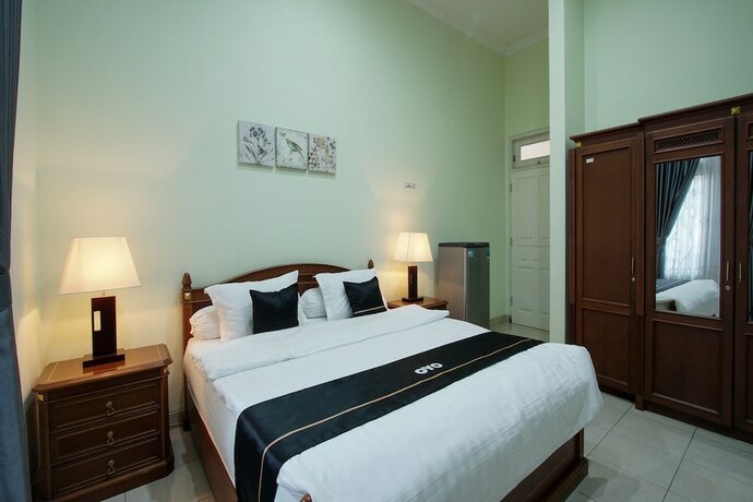Imagen de la habitación del Hotel Collection O 3986 Just 11 Boutique. Foto 17