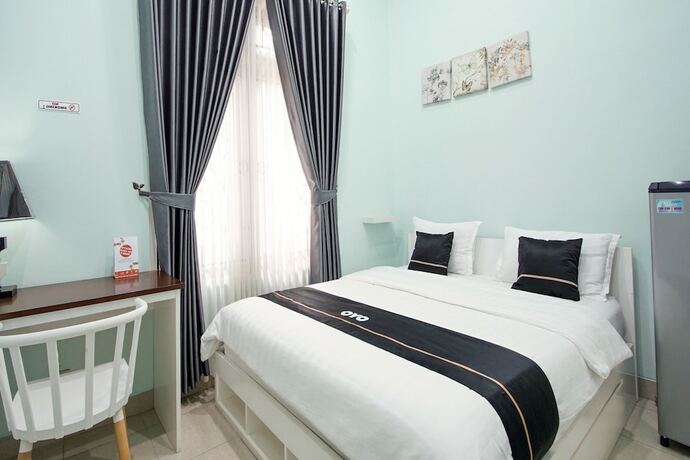 Imagen de la habitación del Hotel Collection O 3986 Just 11 Boutique. Foto 18