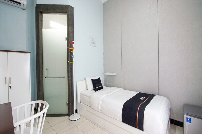 Imagen de la habitación del Hotel Collection O 3986 Just 11 Boutique. Foto 19