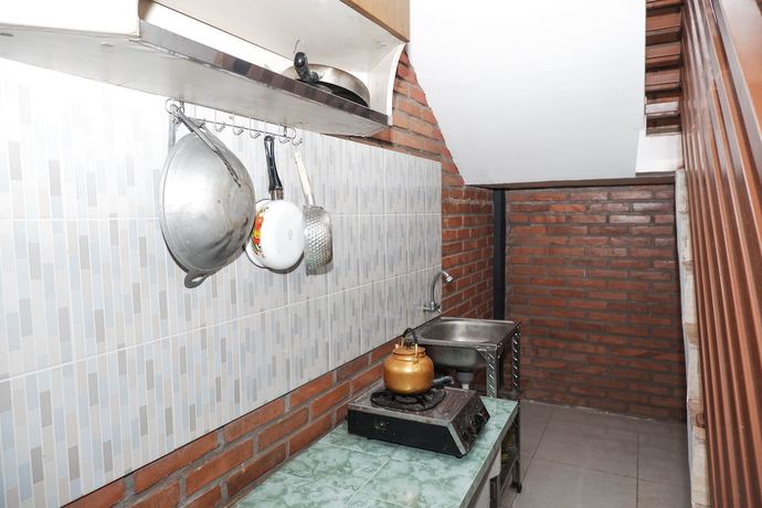 Imagen de la habitación del Hotel Collection O 550 Kebon Krapyak Cottage Syariah. Foto 8