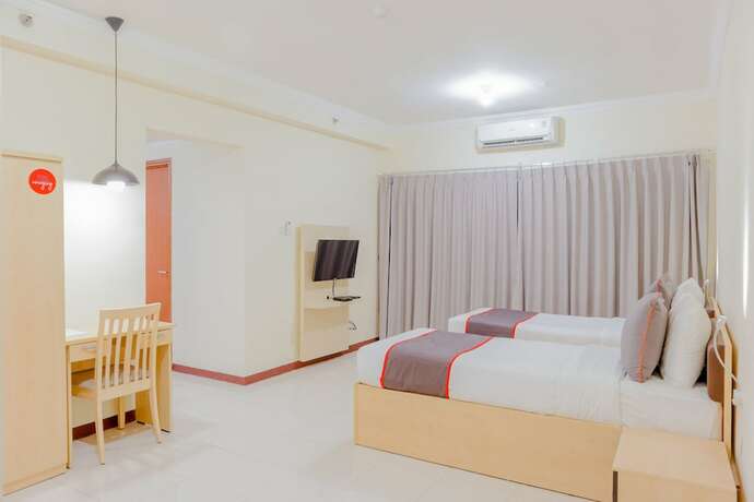 Imagen de la habitación del Hotel Collection O 6 Grand Palace Kemayoran. Foto 18