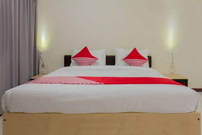 Imagen de la habitación del Hotel Collection O 6 Grand Palace Kemayoran. Foto 19