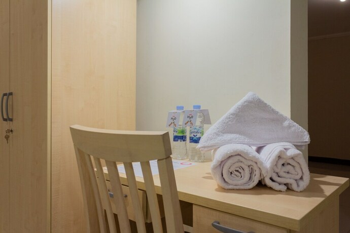Imagen de la habitación del Hotel Collection O 6 Grand Palace Kemayoran. Foto 20