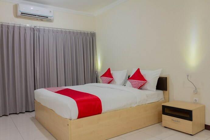 Imagen de la habitación del Hotel Collection O 6 Grand Palace Kemayoran. Foto 21