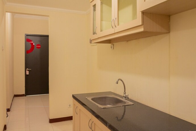 Imagen de la habitación del Hotel Collection O 6 Grand Palace Kemayoran. Foto 23