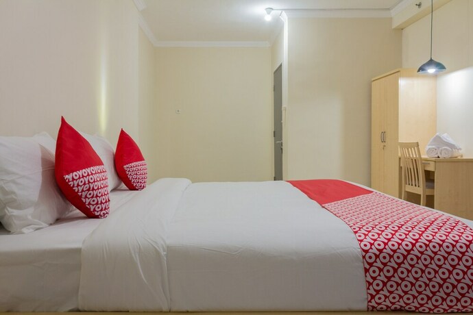 Imagen de la habitación del Hotel Collection O 6 Grand Palace Kemayoran. Foto 24