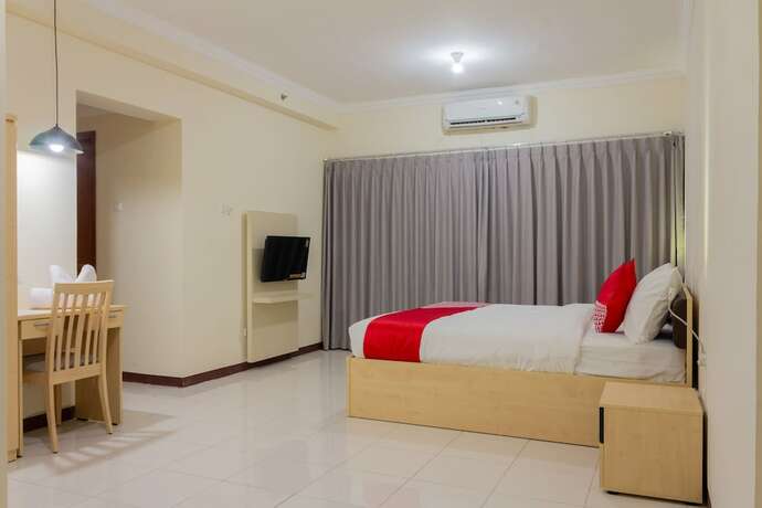 Imagen de la habitación del Hotel Collection O 6 Grand Palace Kemayoran. Foto 30