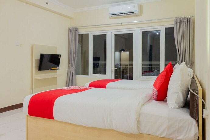 Imagen de la habitación del Hotel Collection O 6 Grand Palace Kemayoran. Foto 31