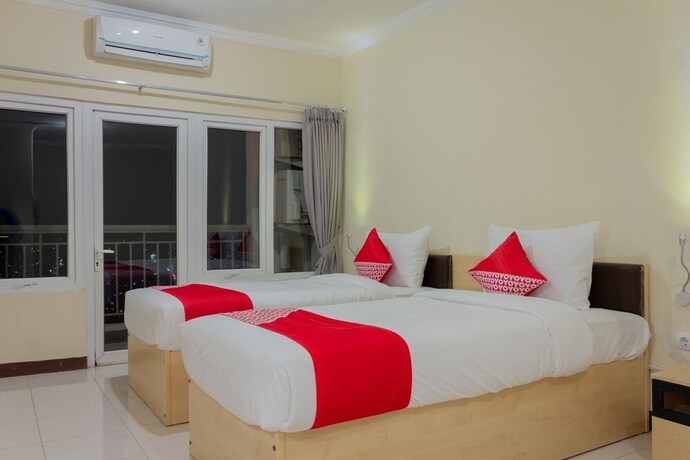Imagen de la habitación del Hotel Collection O 6 Grand Palace Kemayoran. Foto 33