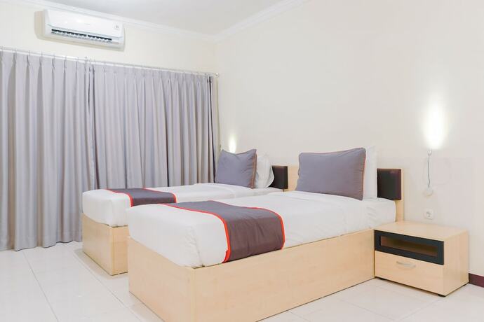 Imagen de la habitación del Hotel Collection O 6 Grand Palace Kemayoran. Foto 34