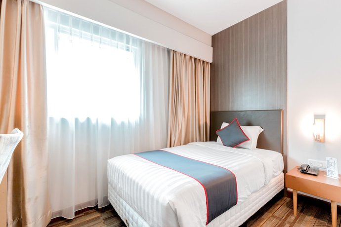 Imagen de la habitación del Hotel Collection O 7 Hotel Melawai. Foto 3