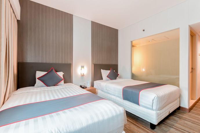 Imagen de la habitación del Hotel Collection O 7 Hotel Melawai. Foto 9