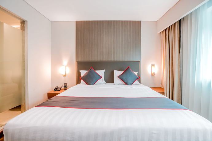Imagen de la habitación del Hotel Collection O 7 Hotel Melawai. Foto 15