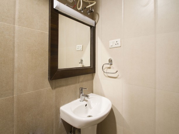 Imagen de la habitación del Hotel Collection O 7601 Park Heights Banjara Hills. Foto 8