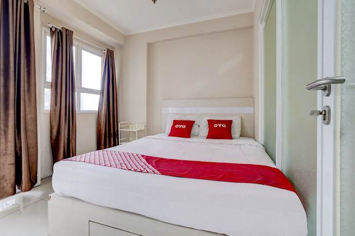 Imagen de la habitación del Hotel Collection O 90205 Queen Rent Apartment Gateway Pasteur. Foto 9
