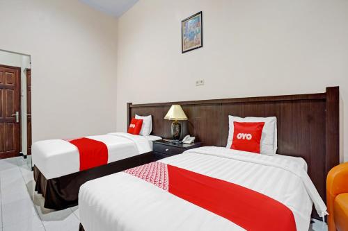 Imagen de la habitación del Hotel Collection O 90693 ORCHID EDOTEL Boyolangu. Foto 20