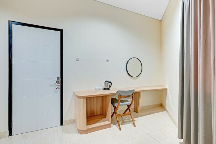 Imagen general del Hotel Collection O 90774 Homi Stay. Foto 3
