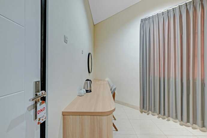 Imagen general del Hotel Collection O 90774 Homi Stay. Foto 7