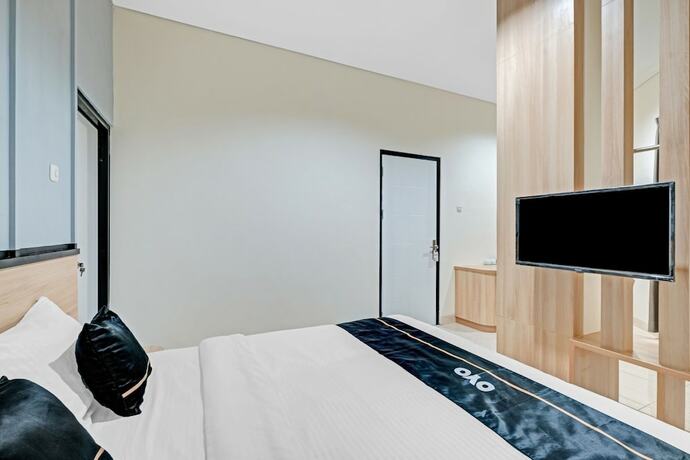 Imagen de la habitación del Hotel Collection O 90774 Homi Stay. Foto 20