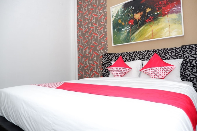 Imagen de la habitación del Hotel Collection O 908 Taman Wisata Kopeng. Foto 5