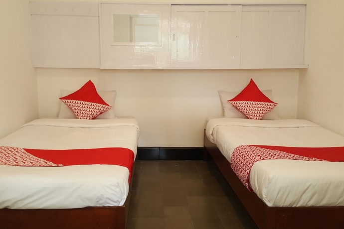 Imagen de la habitación del Hotel Collection O 908 Taman Wisata Kopeng. Foto 8