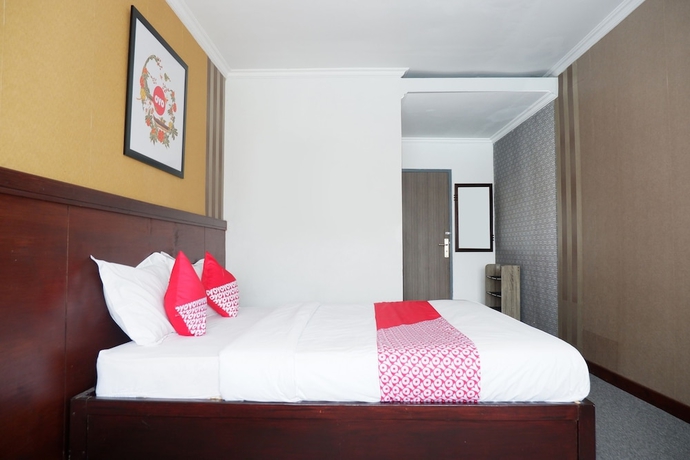 Imagen de la habitación del Hotel Collection O 908 Taman Wisata Kopeng. Foto 9