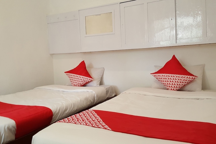 Imagen de la habitación del Hotel Collection O 908 Taman Wisata Kopeng. Foto 11