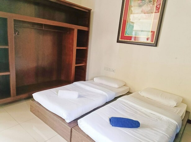 Imagen de la habitación del Hotel Collection O 90859 Bentong Wellness Homestay. Foto 20