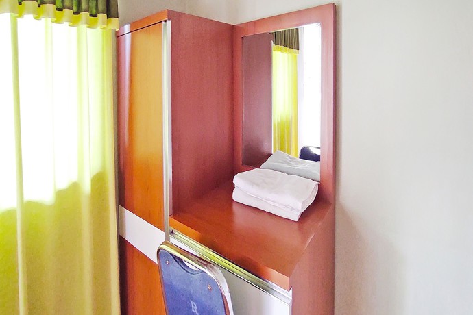 Imagen de la habitación del Hotel Collection O 91046 Remaja Indah Masamba. Foto 2