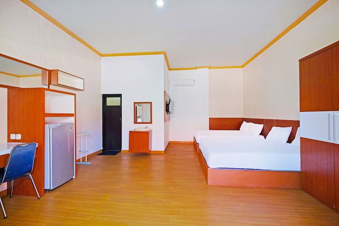 Imagen de la habitación del Hotel Collection O 91046 Remaja Indah Masamba. Foto 4