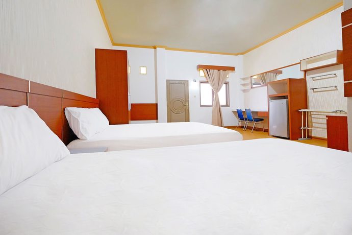 Imagen de la habitación del Hotel Collection O 91046 Remaja Indah Masamba. Foto 5