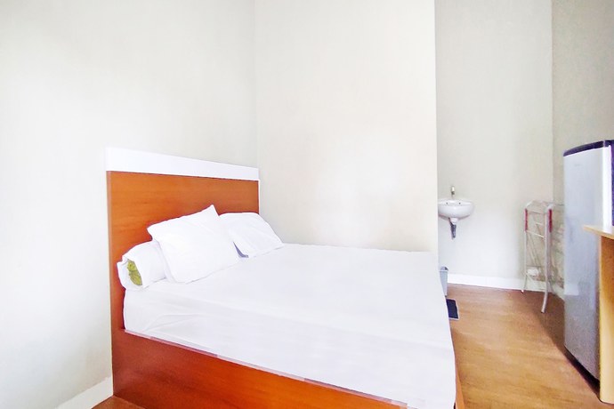 Imagen de la habitación del Hotel Collection O 91046 Remaja Indah Masamba. Foto 6