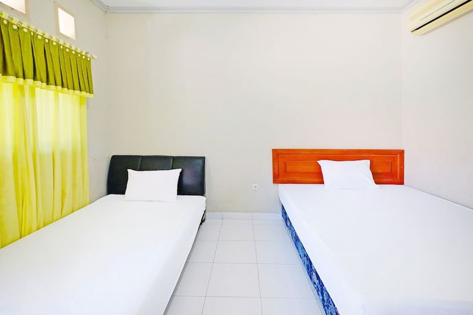 Imagen de la habitación del Hotel Collection O 91046 Remaja Indah Masamba. Foto 8