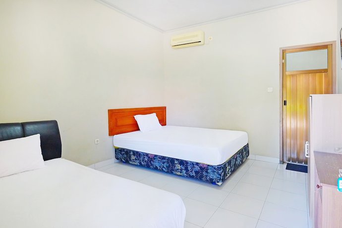Imagen de la habitación del Hotel Collection O 91046 Remaja Indah Masamba. Foto 11