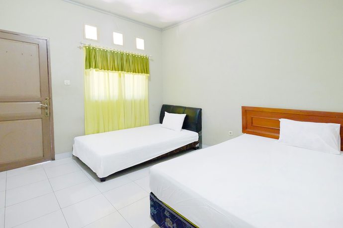 Imagen de la habitación del Hotel Collection O 91046 Remaja Indah Masamba. Foto 12