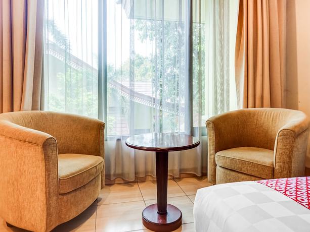 Imagen de la habitación del Hotel Collection O 91071 Desa Wisata Tmii. Foto 2