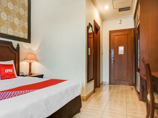 Imagen de la habitación del Hotel Collection O 91071 Desa Wisata Tmii. Foto 7