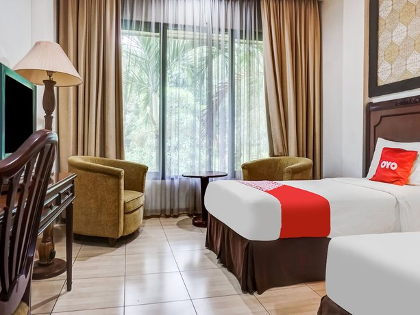 Imagen de la habitación del Hotel Collection O 91071 Desa Wisata Tmii. Foto 13