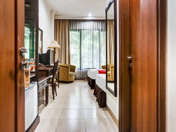 Imagen de la habitación del Hotel Collection O 91071 Desa Wisata Tmii. Foto 15