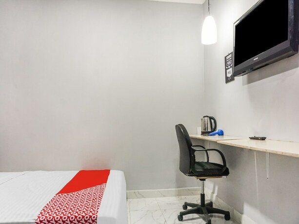 Imagen de la habitación del Hotel Collection O 91131 New V1 Near Stasiun Mangga Besar. Foto 15