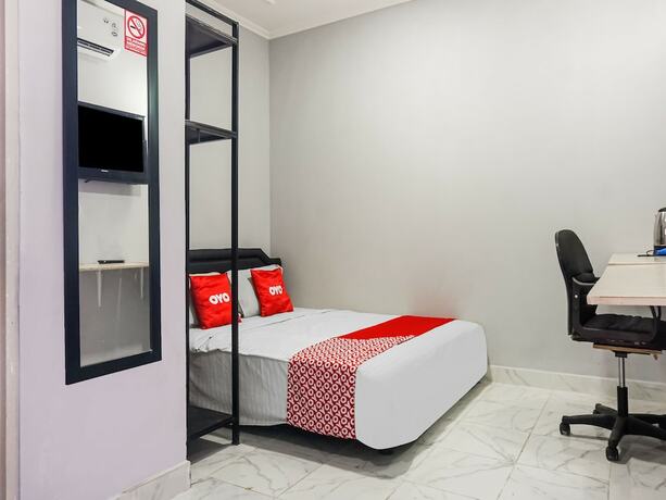 Imagen de la habitación del Hotel Collection O 91131 New V1 Near Stasiun Mangga Besar. Foto 18