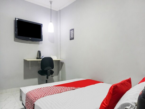 Imagen de la habitación del Hotel Collection O 91131 New V1 Near Stasiun Mangga Besar. Foto 19