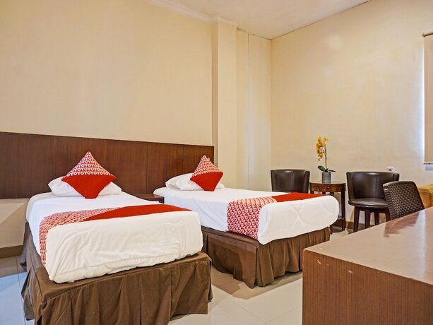 Imagen de la habitación del Hotel Collection O 91414 Marina Beach. Foto 19