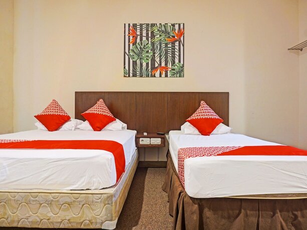 Imagen de la habitación del Hotel Collection O 91414 Marina Beach. Foto 20
