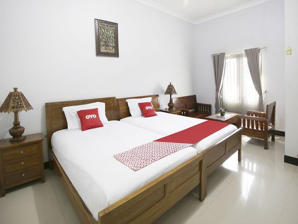 Imagen de la habitación del Hotel Collection O 91449 Griya Ampenan Residence. Foto 2