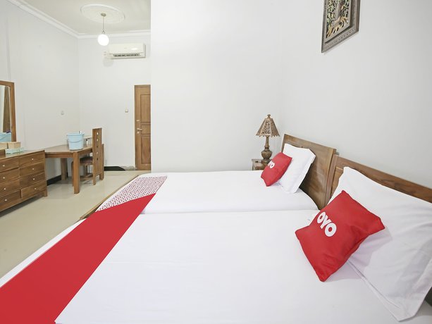 Imagen de la habitación del Hotel Collection O 91449 Griya Ampenan Residence. Foto 4