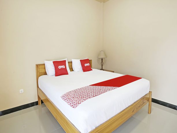 Imagen de la habitación del Hotel Collection O 91449 Griya Ampenan Residence. Foto 5