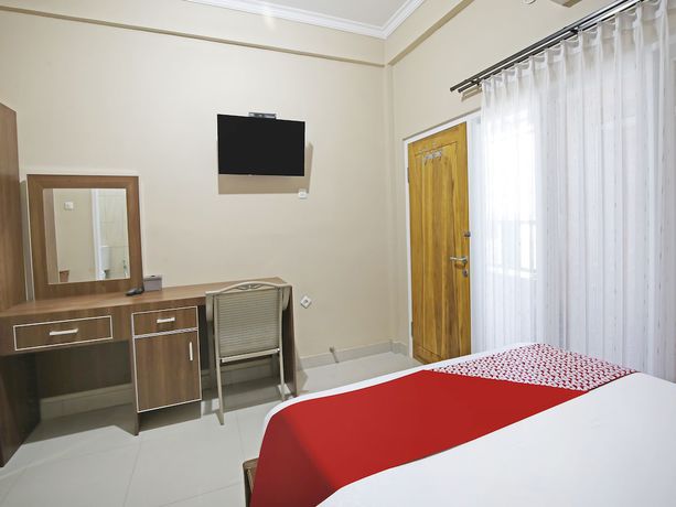Imagen de la habitación del Hotel Collection O 91449 Griya Ampenan Residence. Foto 6