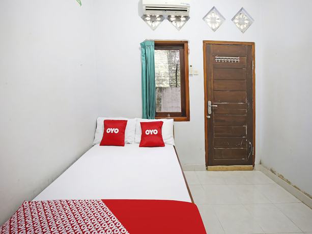 Imagen de la habitación del Hotel Collection O 91449 Griya Ampenan Residence. Foto 7